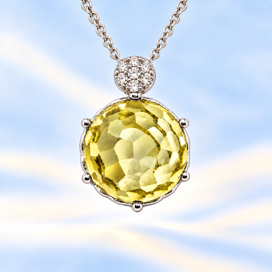 Round lemon quartz pendant with an 8 mm cabochon gemstone in white gold-plated 925 silver. Elegant and hypoallergenic. Available now at BSI Jewelry.