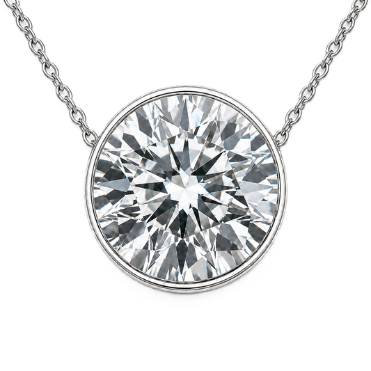 Round moissanite bezel necklace, 10 mm round, crafted in white gold-plated 925 silver. Hypoallergenic and elegant for daily wear. Available now at BSI Jewelry.