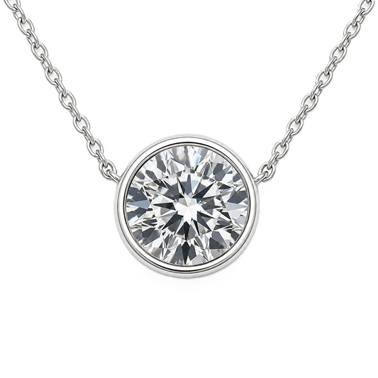 Round moissanite bezel necklace, 6 mm round, crafted in white gold-plated 925 silver. Minimal, elegant, and hypoallergenic. Available now at BSI Jewelry.