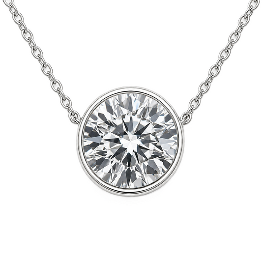 Round moissanite bezel necklace, 7 mm round, crafted in white gold-plated 925 silver. Hypoallergenic and elegant for daily wear. Available now at BSI Jewelry.
