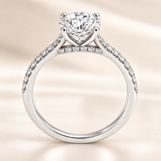 Fall in love with this 6.5mm Round Brilliant Cut Moissanite Engagement Ring in White Gold Plated 925 Silver. GRA Certified, hypoallergenic, and finely crafted by BSI Jewelry.