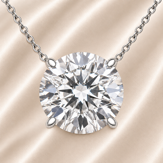 Round moissanite necklace, 10 mm round, crafted in white gold-plated 925 silver. Hypoallergenic and elegant for daily wear. Available now at BSI Jewelry.