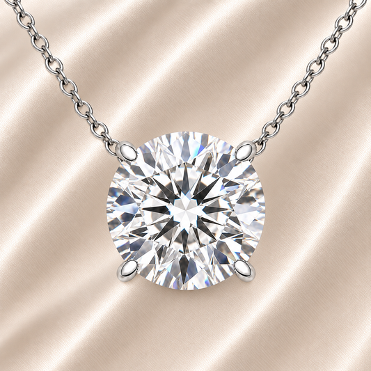 Round moissanite necklace, 9 mm round, crafted in white gold-plated 925 silver. Hypoallergenic and elegant for daily wear. Available now at BSI Jewelry.