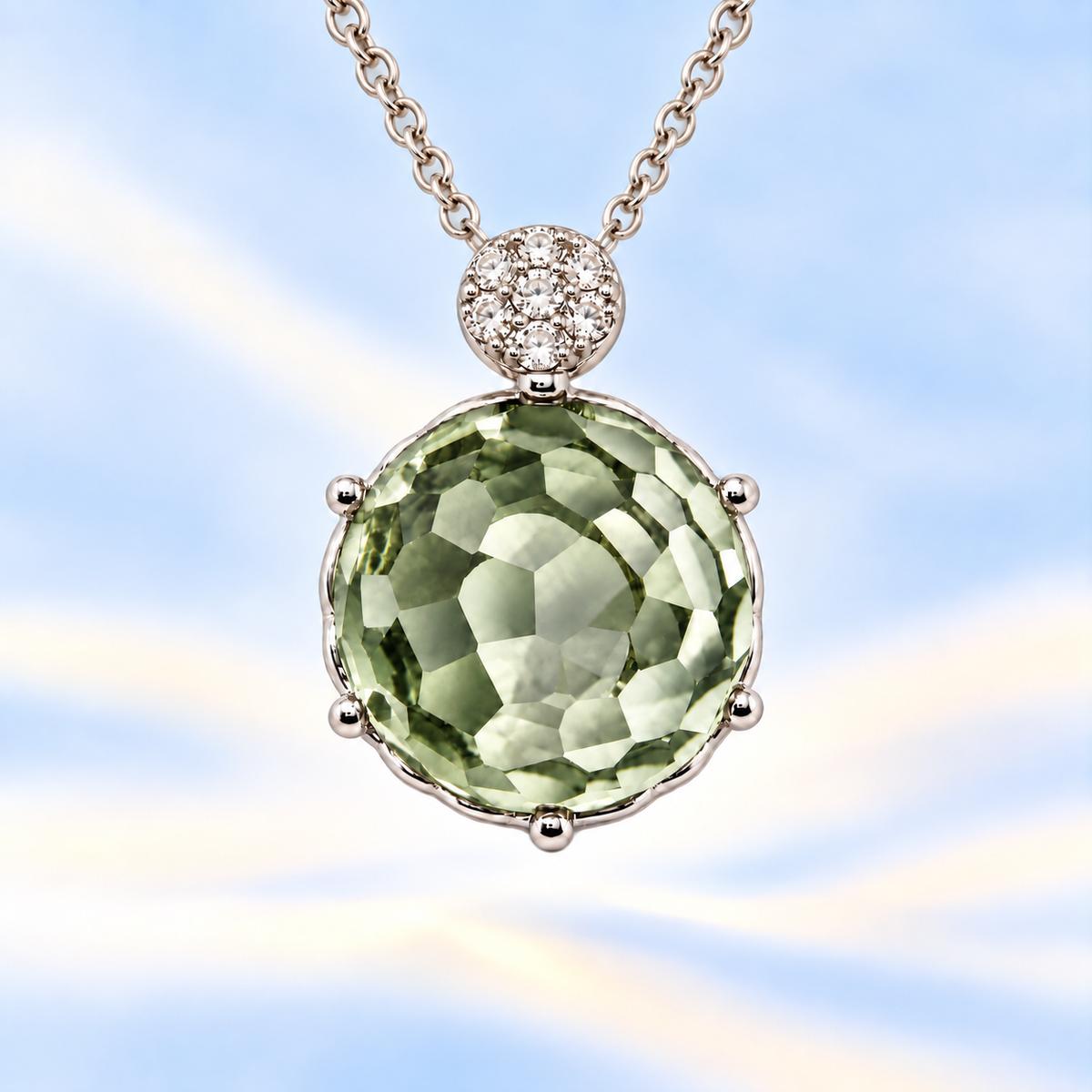 Round prasolite pendant with an 8 mm cabochon gemstone in white gold-plated 925 silver. Elegant and hypoallergenic. Available now at BSI Jewelry.