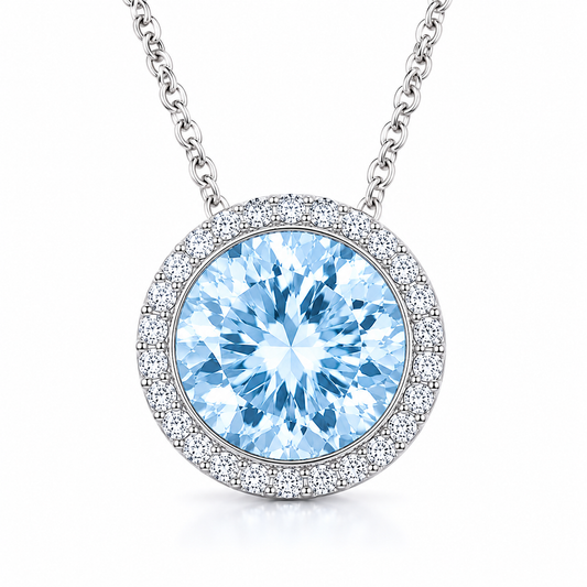Sky blue topaz pendant with a 7 mm round gemstone in white gold-plated 925 silver. Elegant and hypoallergenic. Available now at BSI Jewelry.