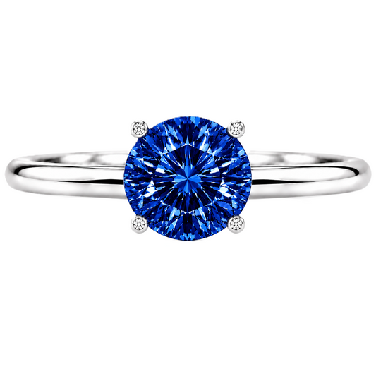 6 mm round blue sapphire engagement ring in white gold-plated 925 silver. Royal, hypoallergenic, and elegant. Available now at BSI Jewelry.