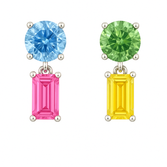 Sapphire drop earrings with 5mm round and 6×3mm emerald cuts, crafted in white gold-plated 925 silver. Elegant and colorful. Available now at BSI Jewelry.