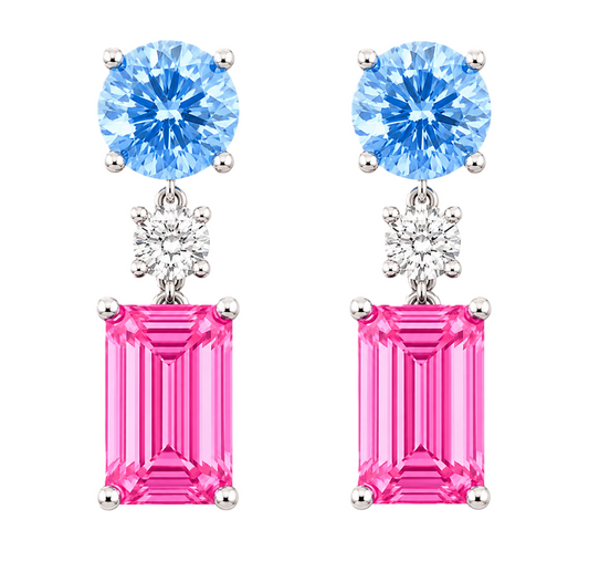Sapphire drop earrings with 5mm round and 7x5mm emerald cuts, crafted in white gold-plated 925 silver. Elegant and colorful. Available now at BSI Jewelry.