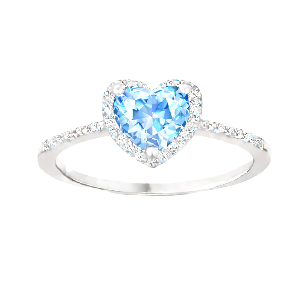 Sky blue topaz ring with a 6 mm heart cut, crafted in white gold-plated 925 silver and accented with moissanite. Available now at BSI Jewelry.