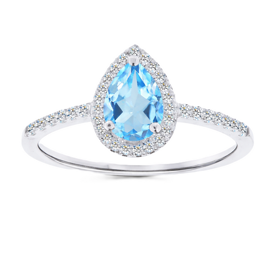 Sky blue topaz ring with a 7×5 mm pear cut, with moissanite in white gold-plated 925 silver. Elegant and timeless for daily wear. Available now at BSI Jewelry.