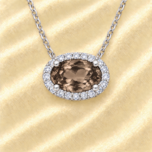 Smoky quartz necklace with 8×5 mm oval gemstone in white gold-plated 925 silver, accented with moissanite. Warm and elegant. Available now at BSI Jewelry.