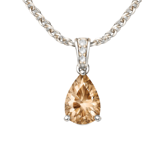 Smoky quartz pendant with an 8×5 mm pear cut, crafted in white gold-plated 925 silver. Warm and elegant for daily wear. Available now at BSI Jewelry.