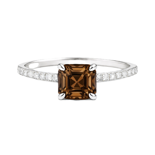 Smoky quartz ring with a 6 mm Asscher-cut stone in white gold-plated 925 silver, accented with moissanite and elegant warm brilliance. Available now at BSI Jewelry.