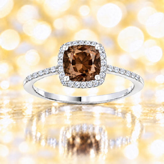 Smoky quartz ring with a 6 mm cushion-cut center in white gold-plated 925 silver, accented with moissanite. Available now at BSI Jewelry.