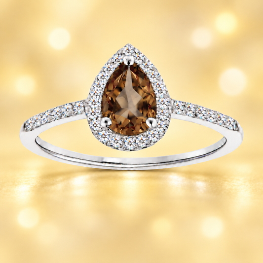 Smoky quartz ring with a 7×5 mm pear cut, with moissanite in white gold-plated 925 silver. Elegant and timeless for daily wear. Available now at BSI Jewelry.