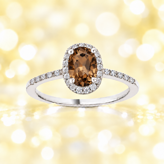 Smoky quartz ring with a 7×5 mm oval cut in white gold-plated 925 silver, with moissanite. Elegant and refined for daily wear. Available now at BSI Jewelry.
