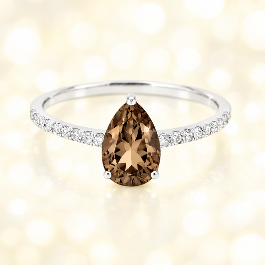 Smoky quartz ring with a 7×5 mm pear-cut stone and moissanite accents in white gold plated 925 silver. Elegant for daily wear. Available now at BSI Jewelry.
