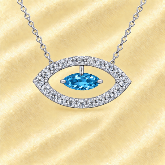 Swiss blue topaz necklace with a 7×3.5 mm marquise-cut stone in white gold-plated 925 silver, accented with moissanite. Available now at BSI Jewelry.