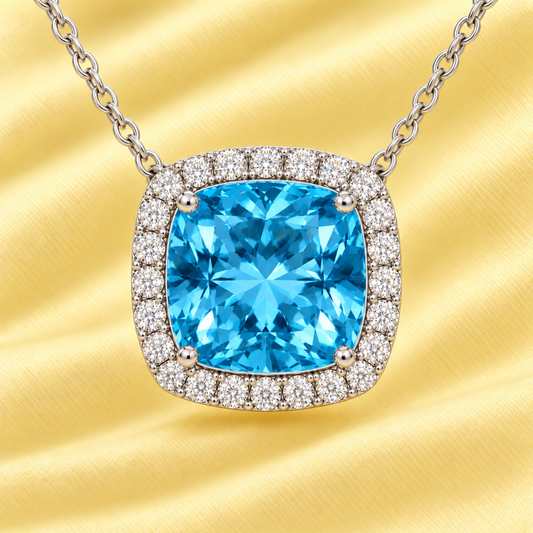 Swiss blue topaz necklace with an 8 mm cushion in white gold-plated 925 silver, accented with moissanite. Elegant for daily wear. Available now at BSI Jewelry.