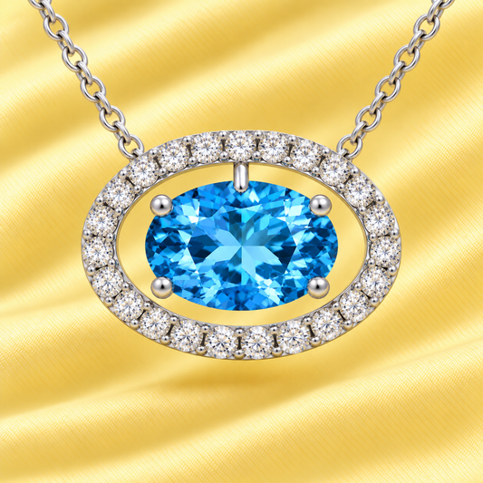 Swiss blue topaz necklace with an 8×5 mm oval in white gold-plated 925 silver, accented with moissanite. Elegant for daily wear. Available now at BSI Jewelry.