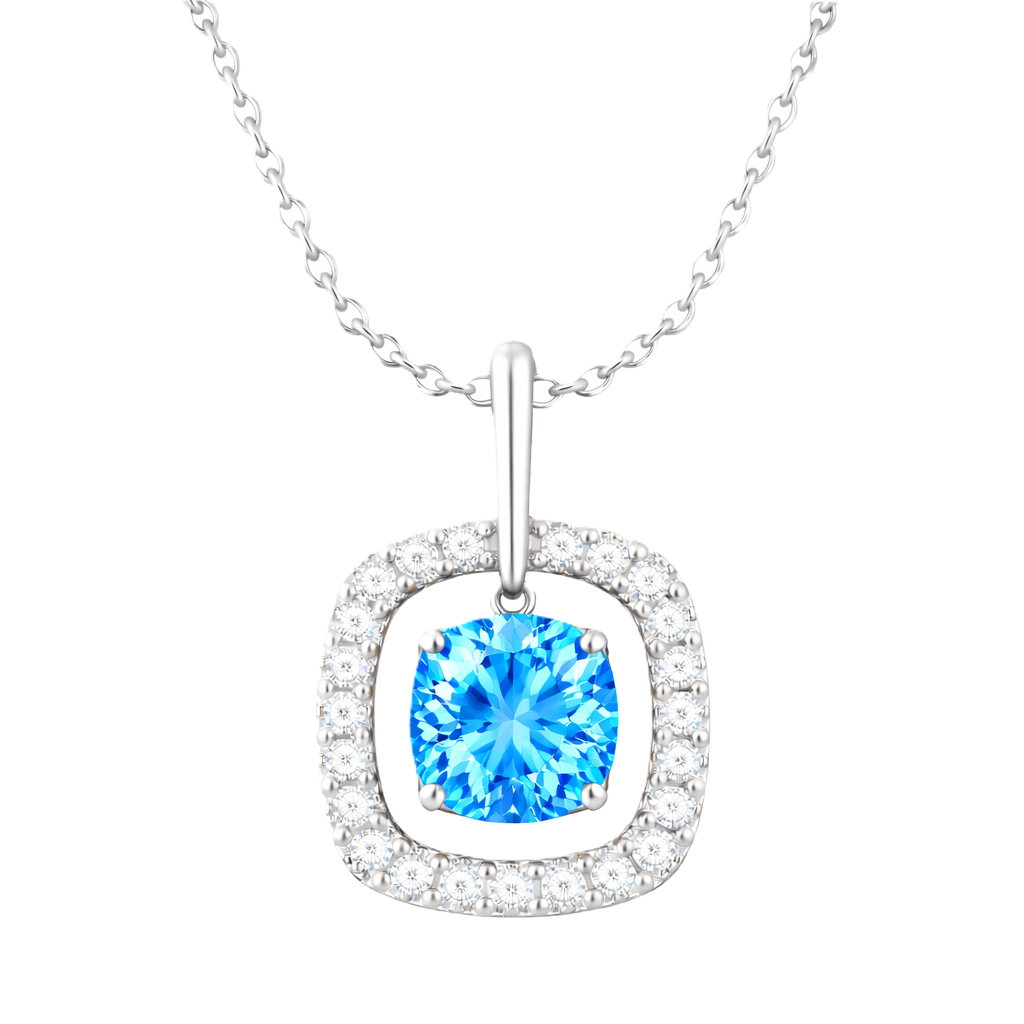 Swiss blue topaz pendant with a 7 mm cushion-cut in white gold-plated 925 silver, accented by a moissanite halo. Elegant and refined. Available now at BSI Jewelry.