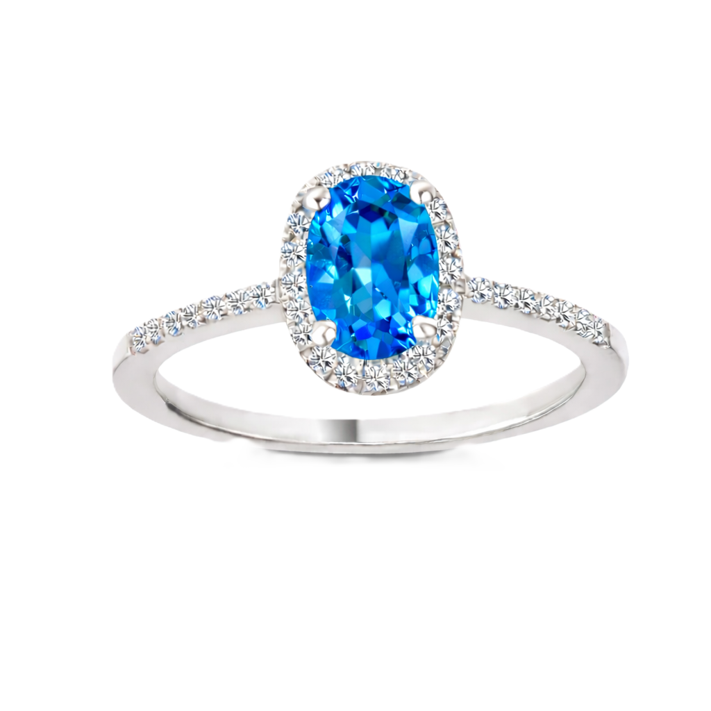 Swiss blue topaz ring with a 7×5 mm oval cut in white gold-plated 925 silver, with moissanite. Elegant and refined for daily wear. Available now at BSI Jewelry.