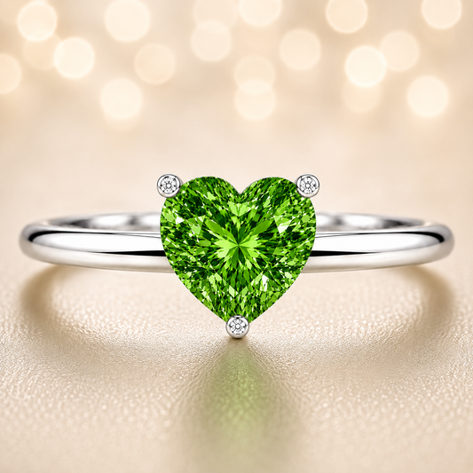 6 mm heart green sapphire engagement ring in white gold-plated 925 silver. Vibrant, hypoallergenic, and elegant. Available now at BSI Jewelry.