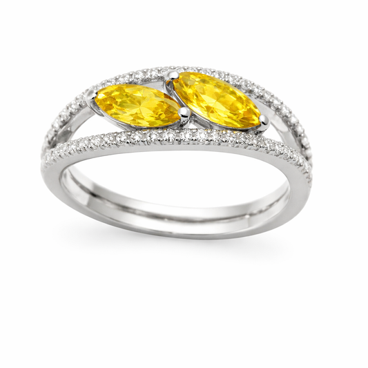 Yellow sapphire crossover ring with 6×3 mm marquise in white gold-plated 925 silver, accented with moissanite. Elegant and contemporary. Available at BSI Jewelry.