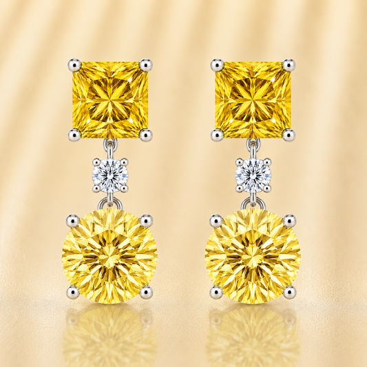 Elegant yellow sapphire drop stud earrings with 5 mm princess and round, crafted in white gold-plated 925 silver with palladium-added alloy. Now at BSI Jewelry.