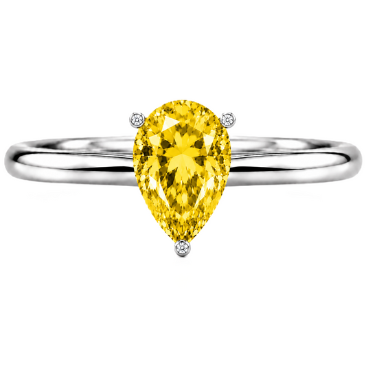 Radiant yellow sapphire engagement ring with a 6×4 mm pear-cut center stone, crafted in white gold plated 925 silver. Available now at BSI Jewelry.