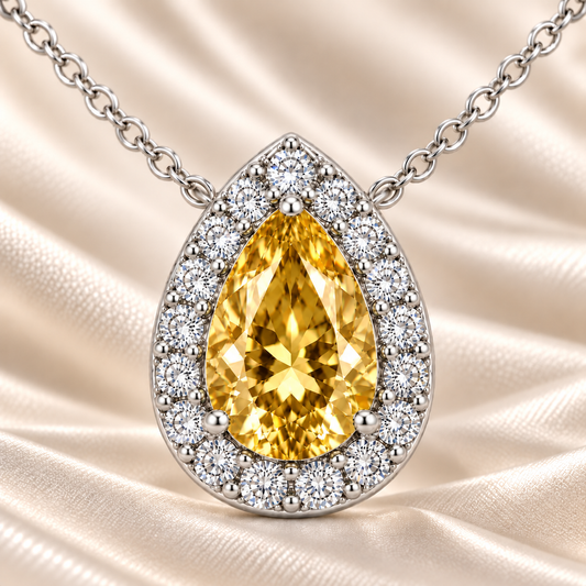 Yellow Sapphire Halo Necklace with pear-cut sapphire and brilliant moissanite halo in white gold plated 925 silver.