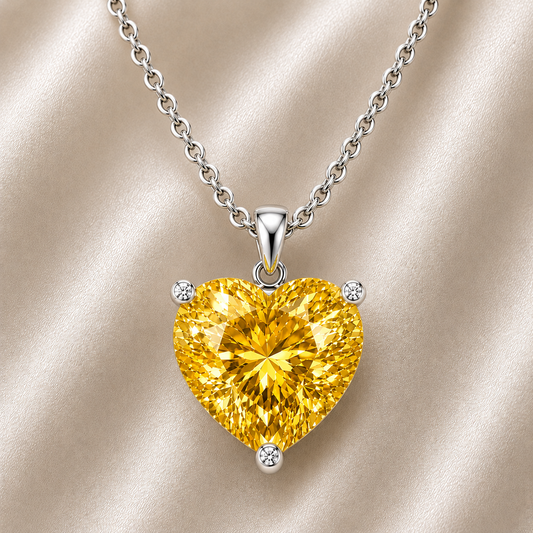 Yellow sapphire heart necklace featuring a vibrant 6 mm heart gemstone in white gold-plated 925 silver. Bright, elegant, and available now at BSI Jewelry.