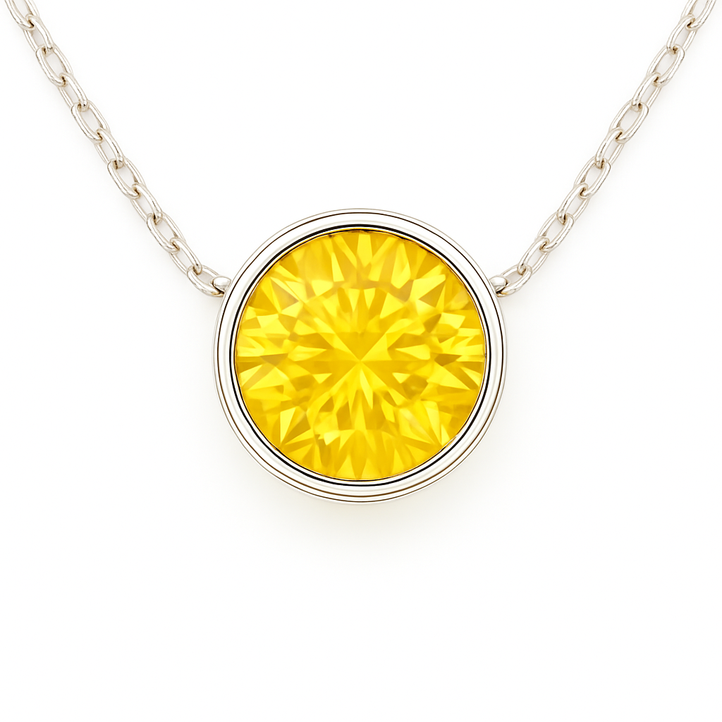 Yellow sapphire solitaire necklace with 5mm round brilliant-cut stone, crafted in white gold-plated 925 silver. Radiant and hypoallergenic. Available now at BSI Jewelry.