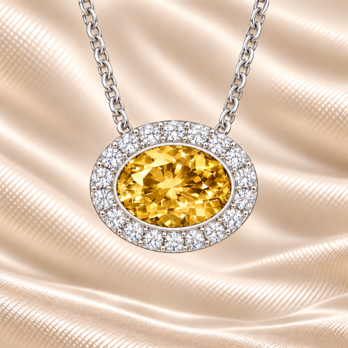 Yellow sapphire necklace with a 7×5 mm oval stone in white gold-plated 925 silver, accented with moissanite. Warm and elegant. Available now at BSI Jewelry.