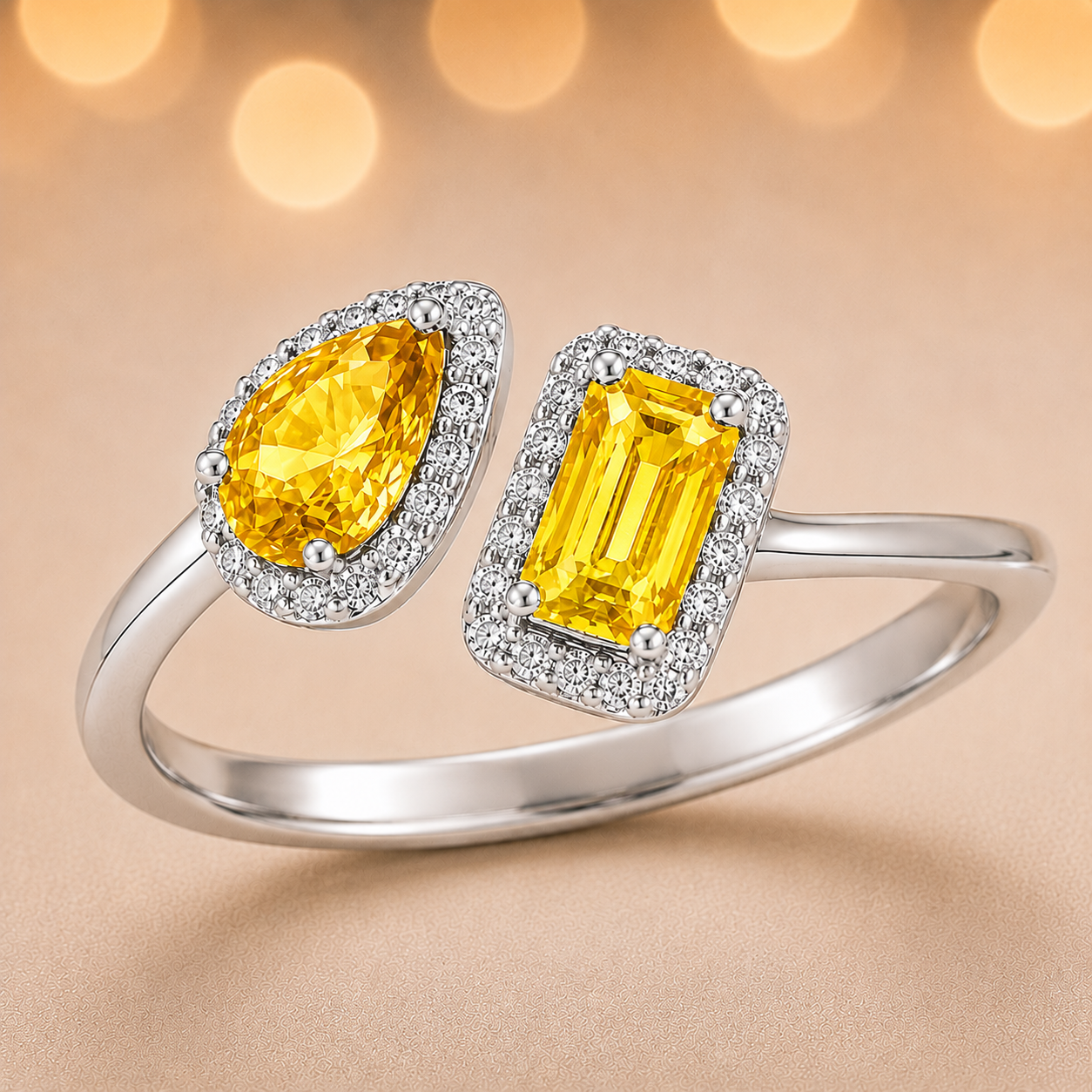 Yellow sapphire open ring with 5×3 mm pear and emerald stones in white gold plated 925 silver. Elegant and modern design. Available now at BSI Jewelry.