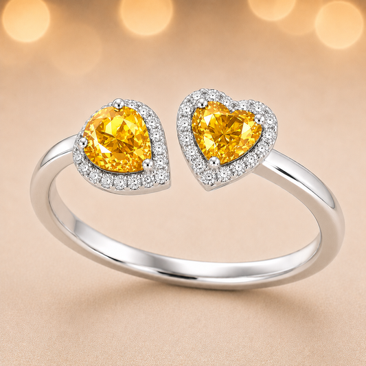 Yellow sapphire open ring with 6×4 mm pear and 5 mm heart cuts, crafted in white gold-plated 925 silver. Bright and hypoallergenic. Available now at BSI Jewelry.