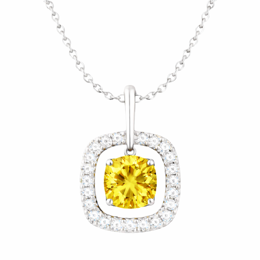 Yellow sapphire pendant with a 7 mm cushion cut and moissanite halo, crafted in white gold-plated 925 silver. Elegant and radiant. Available now at BSI Jewelry.