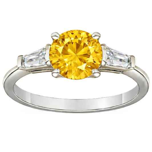 Yellow sapphire ring, 6 mm round, with tapered moissanite accents in white gold-plated 925 silver. Bright and elegant. Available now at BSI Jewelry.