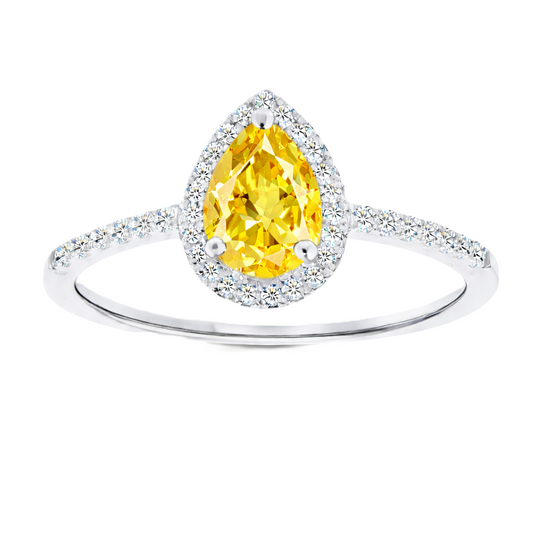 Yellow sapphire ring with a 7×5 mm pear cut, with moissanite in white gold-plated 925 silver. Elegant and timeless for daily wear. Available now at BSI Jewelry.
