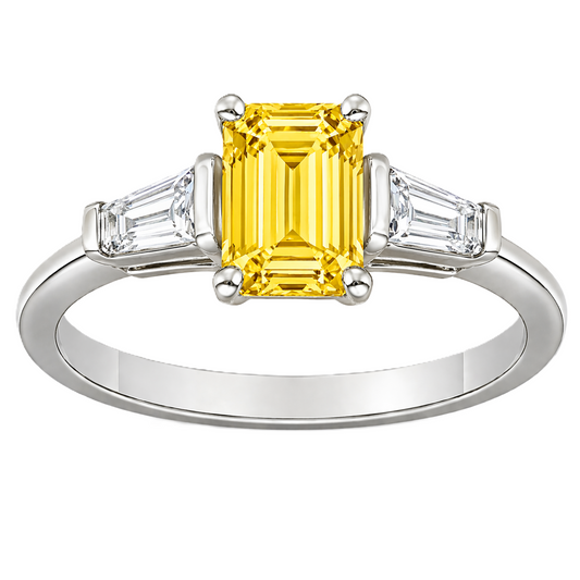 Yellow sapphire ring, 7×5 mm emerald cut with tapered moissanite, crafted in white gold-plated 925 silver. Elegant and radiant. Available now at BSI Jewelry.