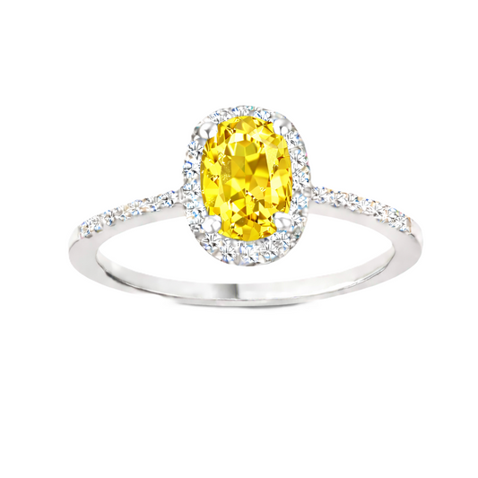 Yellow sapphire ring with a 7×5 mm oval cut in white gold-plated 925 silver, with moissanite. Elegant and refined for daily wear. Available now at BSI Jewelry.