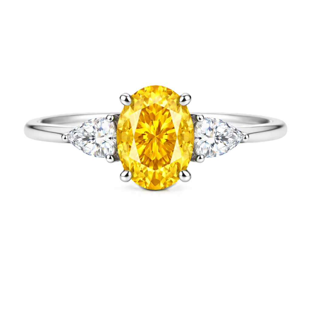 Yellow sapphire ring with 7×5 mm oval center in white gold-plated 925 silver. Hypoallergenic silver for comfortable daily wear. Available now at BSI Jewelry.