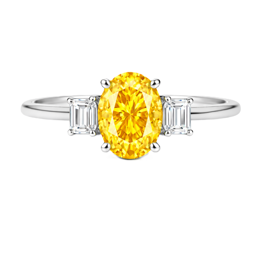 Yellow sapphire ring with 7×5 mm oval center and 5×3 mm moissanite sides in white gold-plated 925 silver. Elegant and refined. Available now at BSI Jewelry.