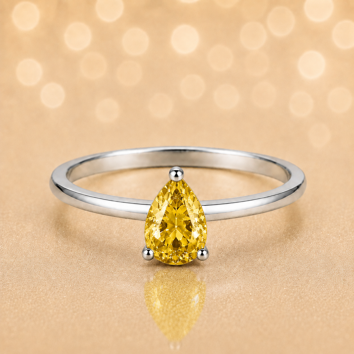 Yellow sapphire solitaire ring with a 6×4 mm pear in white gold-plated 925 silver. Elegant, minimal, and timeless for daily wear. Available now at BSI Jewelry.