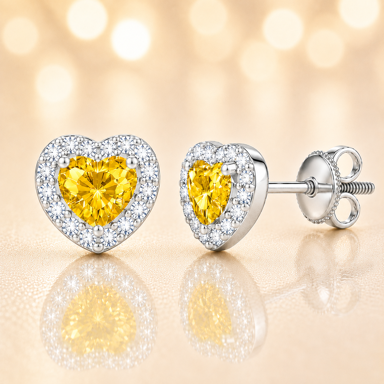 Yellow sapphire stud earrings with 4 mm heart cut in white gold-plated 925 silver, accented with moissanite and screw-back posts. Available now at BSI Jewelry.