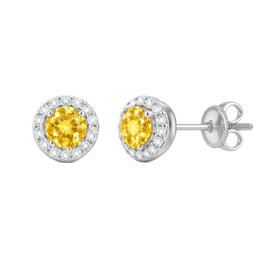 Yellow sapphire stud earrings with 4 mm round cut in white gold-plated 925 silver, accented with moissanite and screw-back posts. Available now at BSI Jewelry.