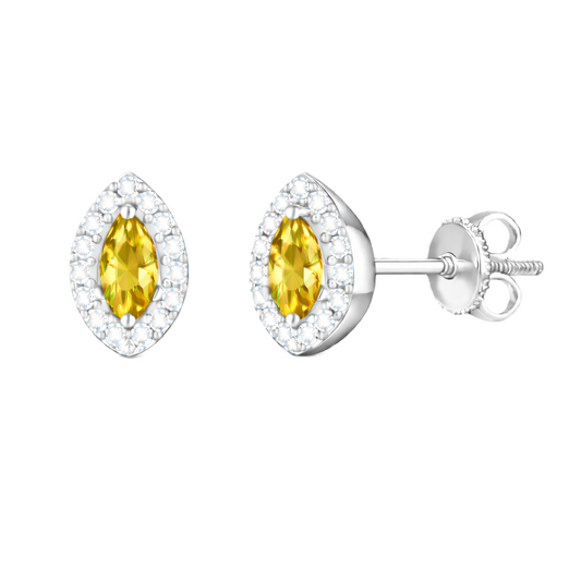 Yellow sapphire stud earrings with 5×2.5 mm marquise in white gold-plated 925 silver, accented with moissanite. Warm and elegant. Available now at BSI Jewelry.