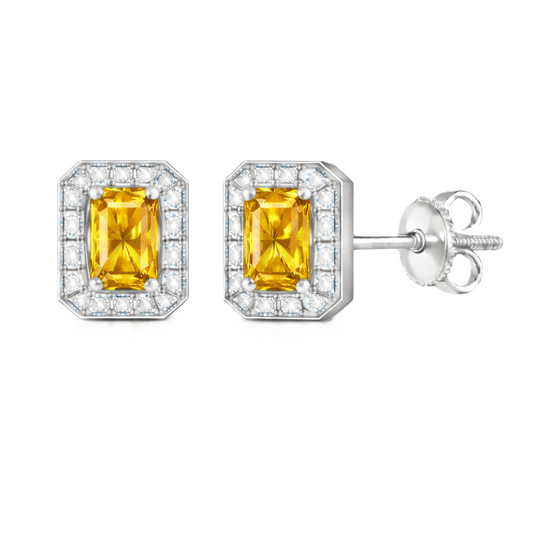 Yellow sapphire stud earrings with 5×3 mm emerald in white gold-plated 925 silver, accented with moissanite and screw-back posts. Available now at BSI Jewelry.